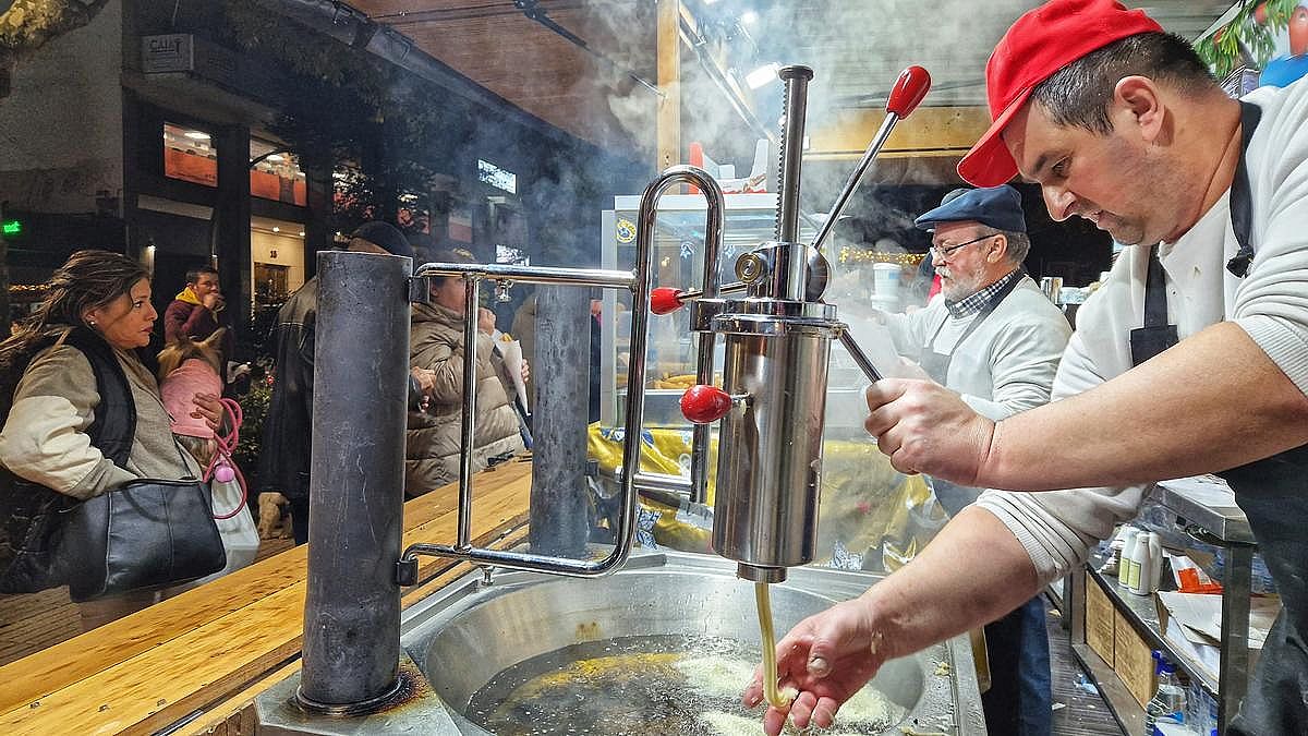 Waar komt de naam churros vandaan in Spanje?