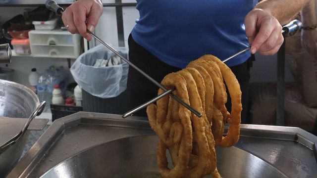 Waar komt de naam churros vandaan in Spanje?